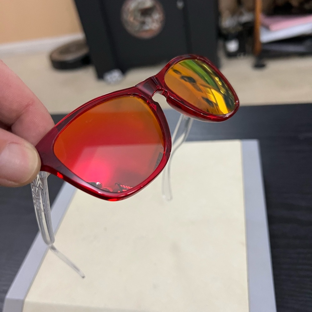 Oakley Frogskins Red and transparent with Fire lenses.